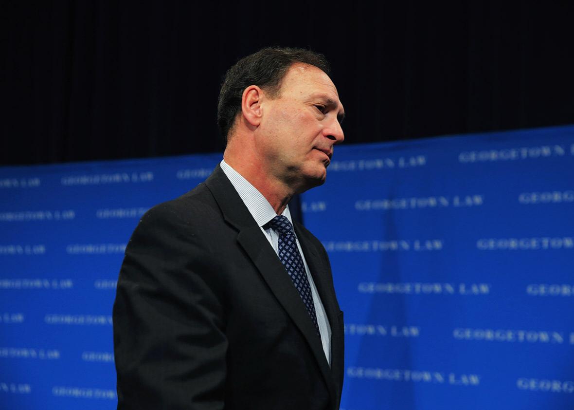U.S. Supreme Court Associate Justice Samuel Alito leaves after speaking during the Georgetown University Law Center's third annual Dean's Lecture to the Graduating Class in the Hart Auditorium in McDonough Hall February 23, 2016 in Washington, DC.