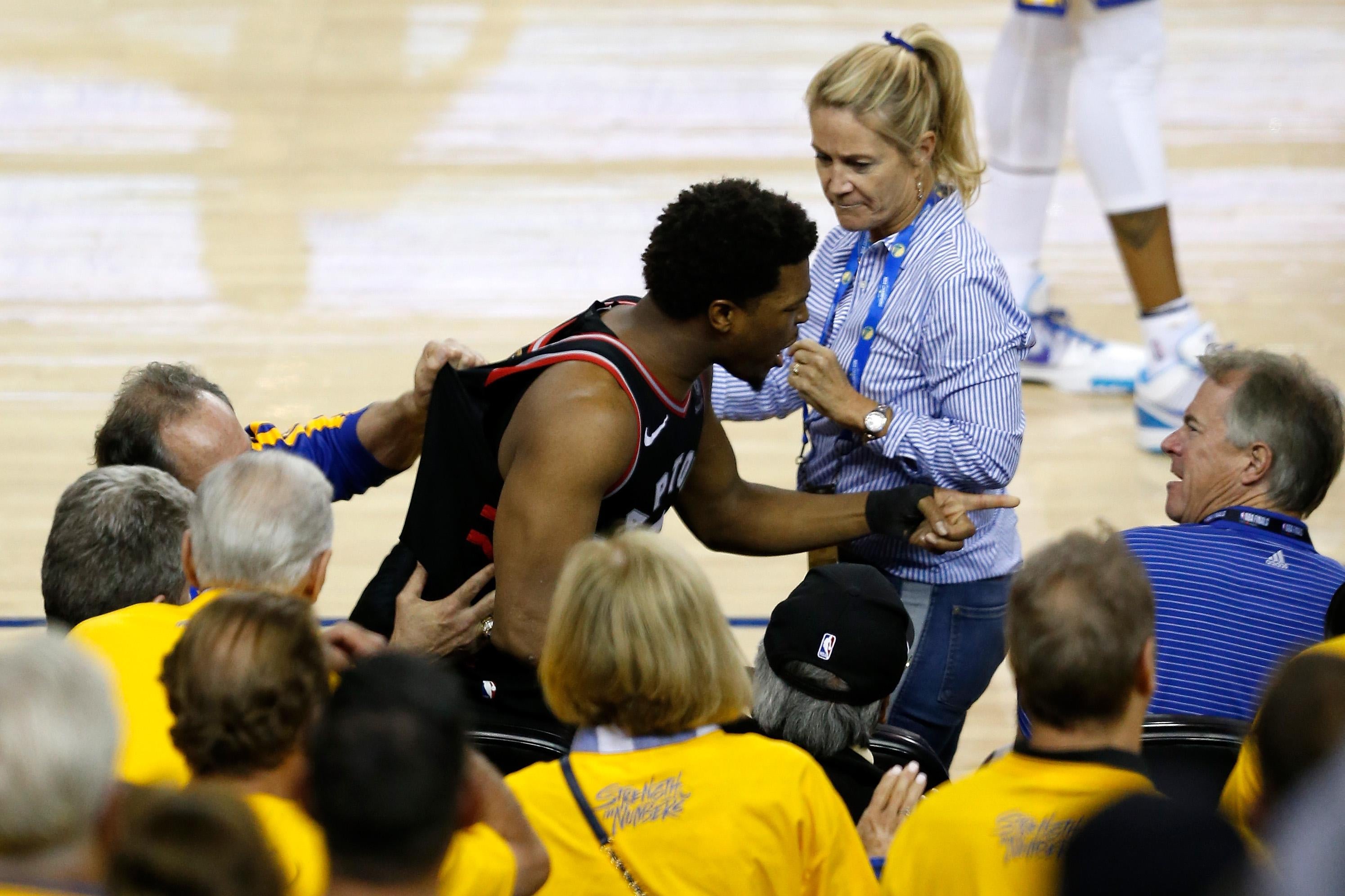Kyle Lowry argues with Warriors minority investor Mark Steven.