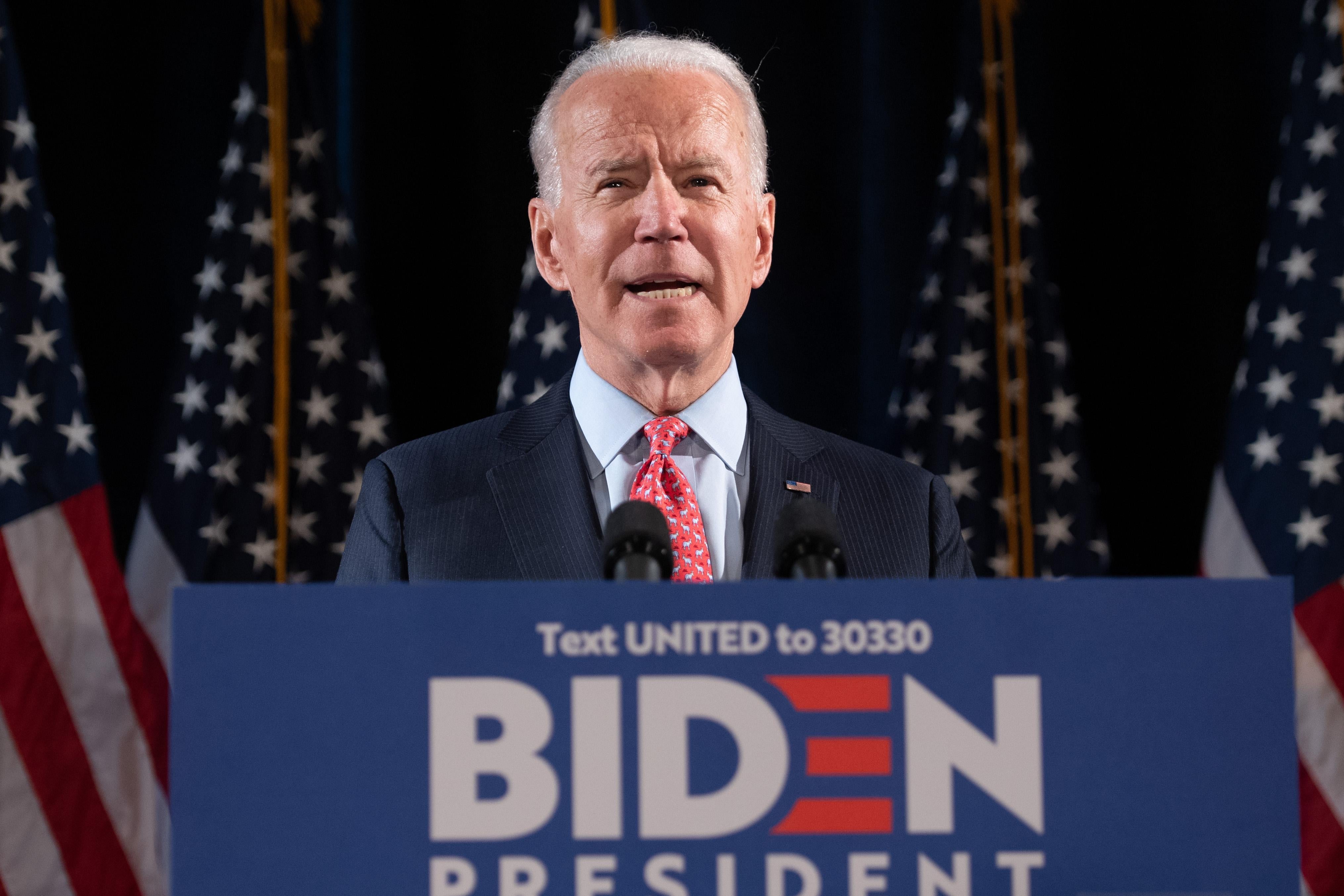Joe Biden, standing at a podium.