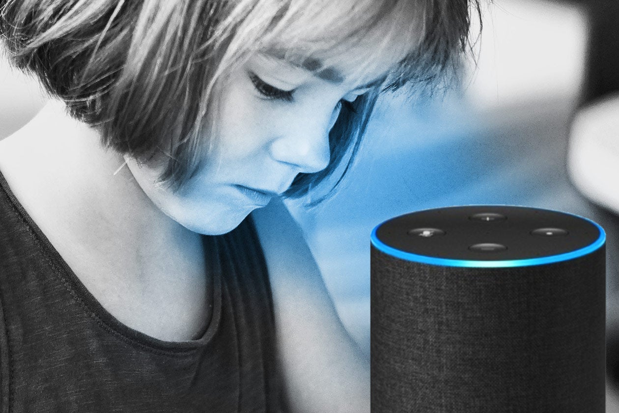 Child looking at an Amazon Echo.