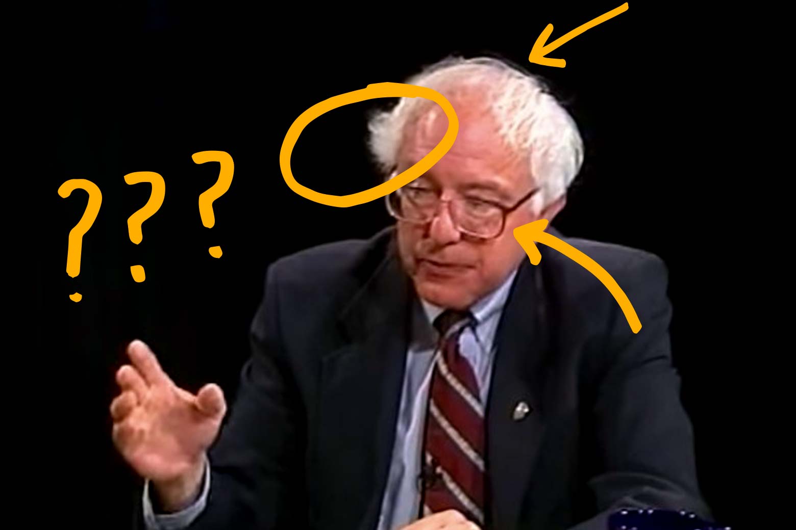 Screenshot from video of Bernie Sanders speaking, annotated with question marks and arrows.