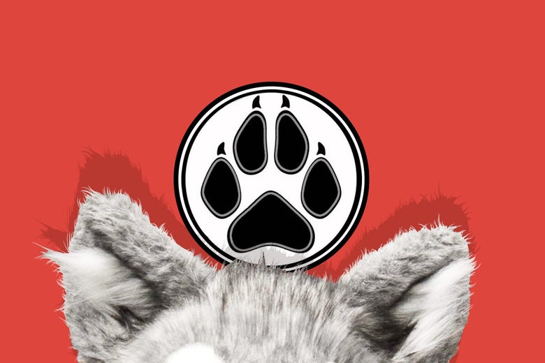 The head and ears of a furry animal costume with a paw in a circle on a red band in the background.