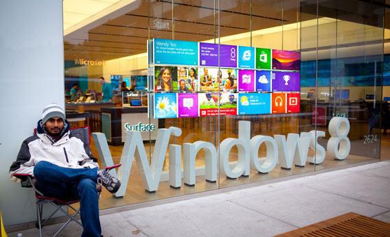 A prepared shopper waits for the Seattle Microsoft Store to open, Oct. 26, 2012. 