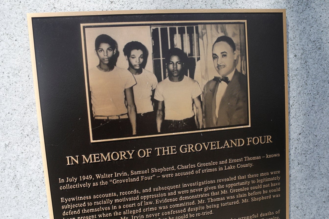 A monument of the "Groveland Four" is pictured in front of the Lake County Historical Society Museum in Tavares, FL.