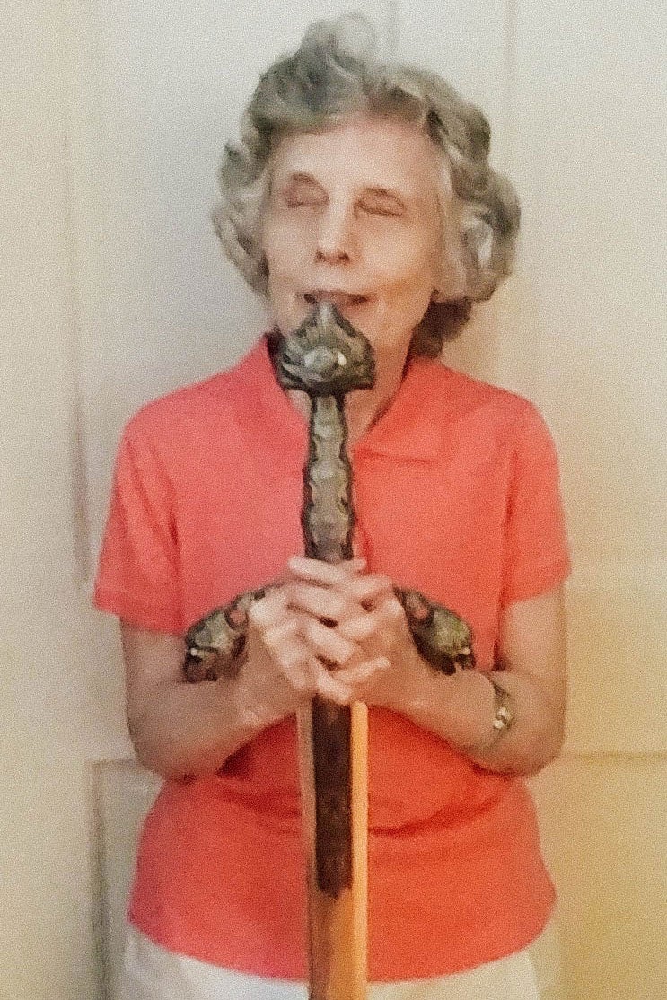 Gearreald holds the sword by the hilt.