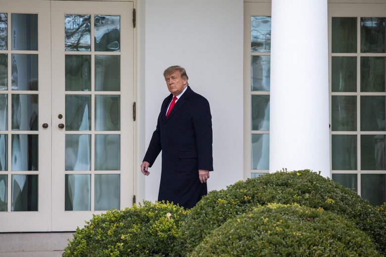 President Donald Trump walks to the Oval Office while arriving back at the White House on December 31, 2020 in Washington, D.C.