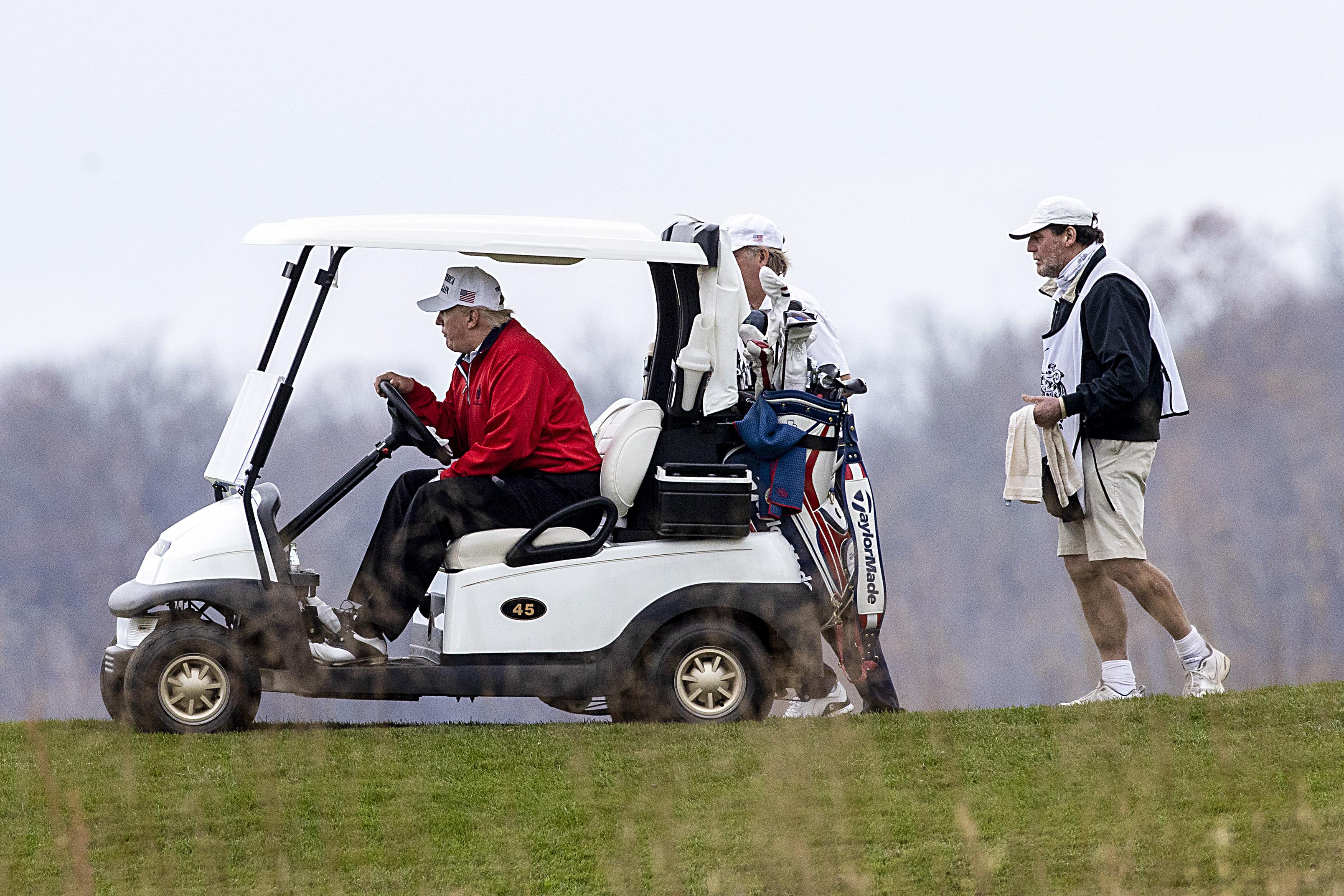 President Donald Trump golfs at Trump National Golf Club on November 21, 2020in Sterling, Virginia.