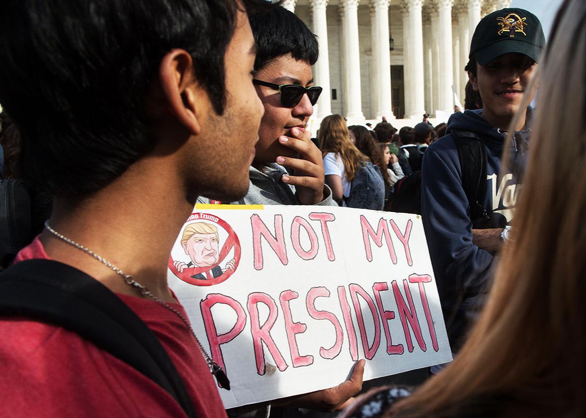 Secondary school students gather in front of the Supreme Court in Washington, DC, on November 15, 2016 as they protest the election of US President-elect Donald Trump.