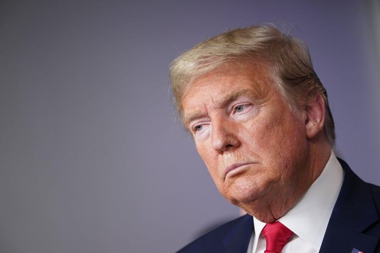 Donald Trump listening to someone off-screen