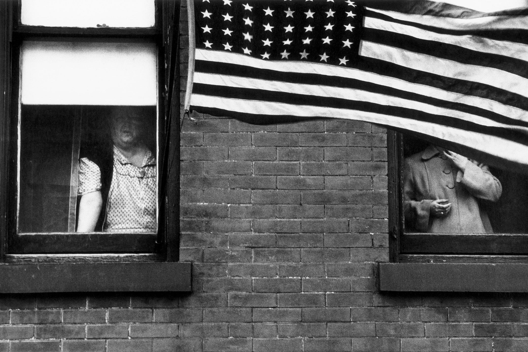 Robert Frank's Parade—Hoboken, New Jersey, 1955.