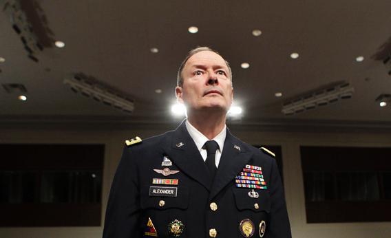 General Keith Alexander, commander of the U.S. Cyber Command, director of the National Security Agency and chief of the Central Security Service, arrives at the Senate Appropriations Committee hearing on Cybersecurity: Preparing for and Responding to the Enduring Threat, on Capitol Hill in Washington June 12, 2013.