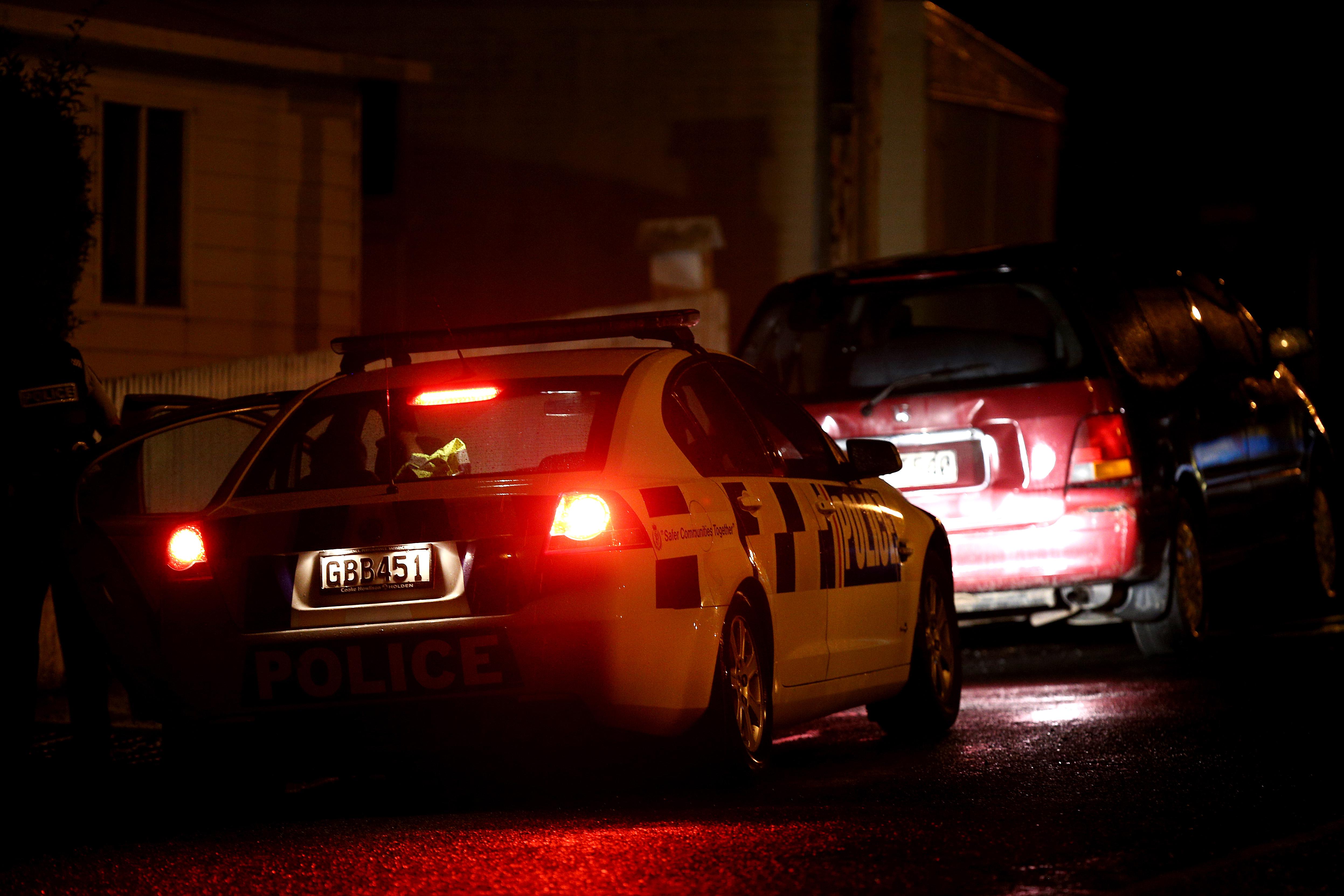 Police investigate a property in Dunedin, New Zealand. Residents have been evacuated off the street as police investigate a property believed to be related to the deadly terror attacks in Christchurch on Friday.