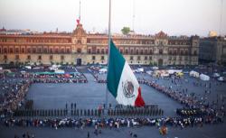 Mexican flag in plaza, Mexico City.