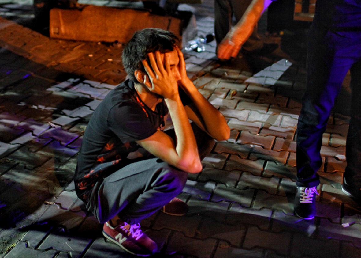 A relative of the Ataturk Airport suicide bomb attack victim wait dejectedly outside Bakirkoy Sadi Konuk Hospital, in the early hours of June 29, 2016 in Istanbul, Turkey. 