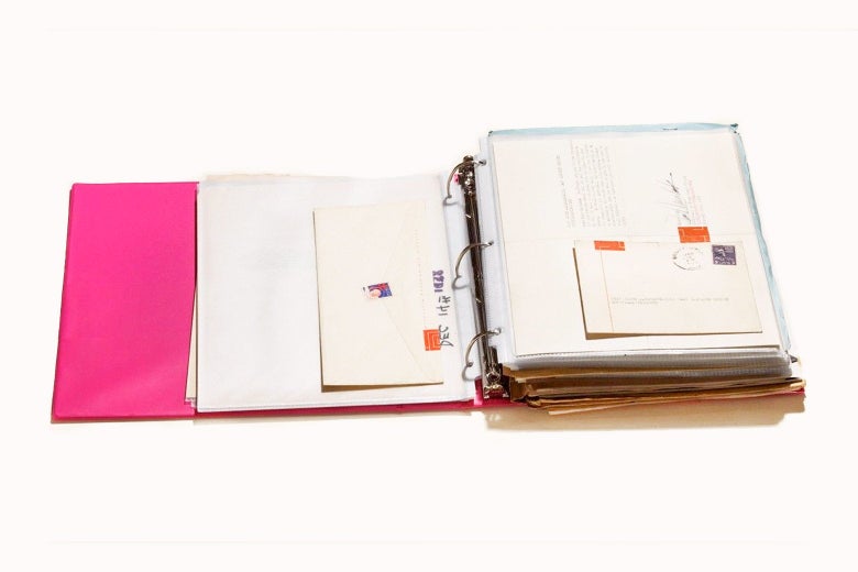 Open binder full of correspondence