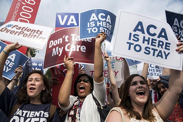Supporters of the Affordable Care Act celebrate after the Supreme Court upheld the law in a 6–3 vote at the Supreme Court in Washington, D.C., on June 25, 2015