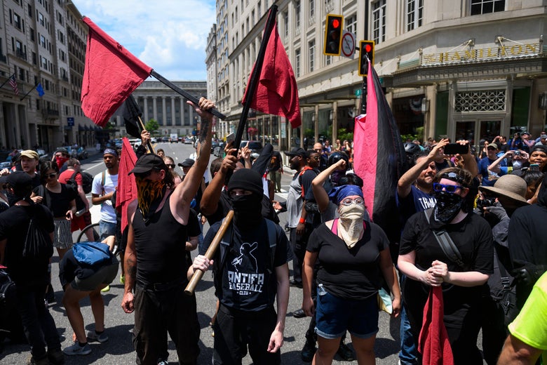 Antifa activists in black shirts and masks in downtown Washington.