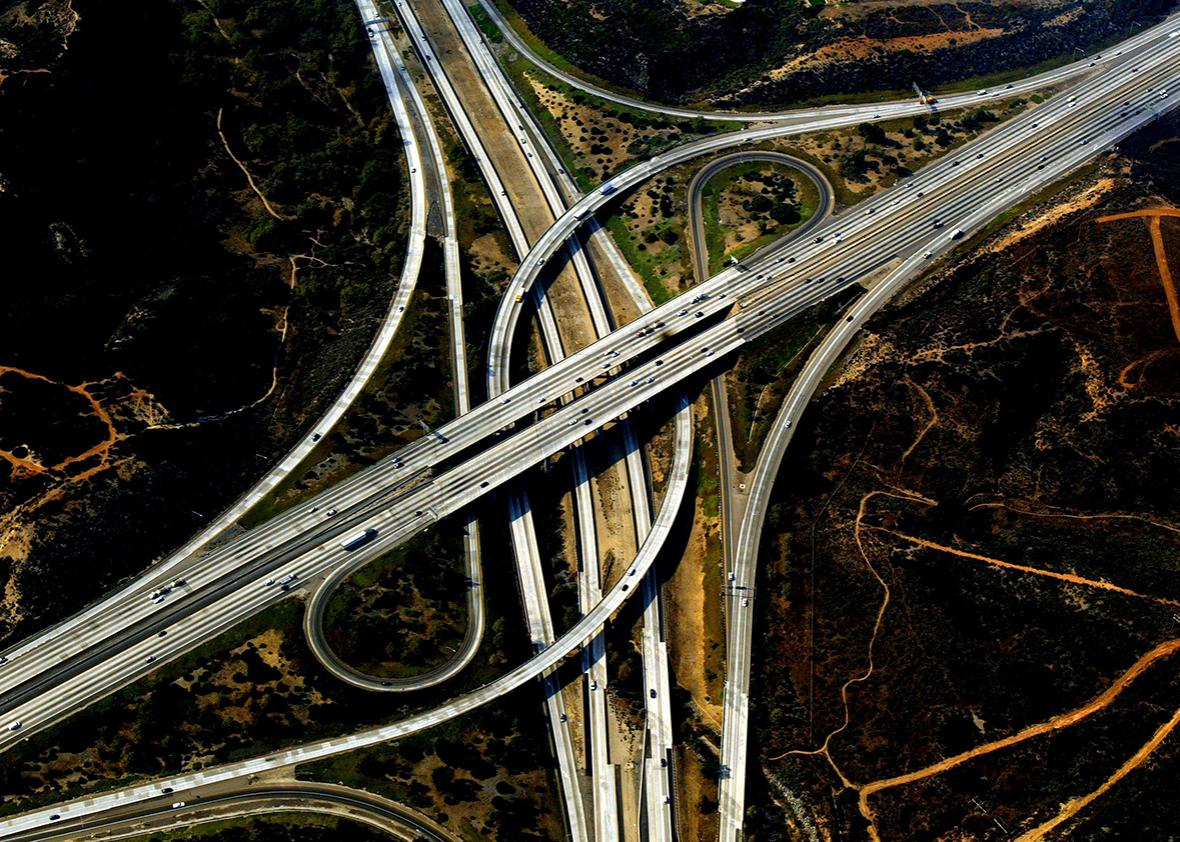 A freeway interchange with burnt fields nearby is seen in this aerial view October 30, 2003, in San Diego