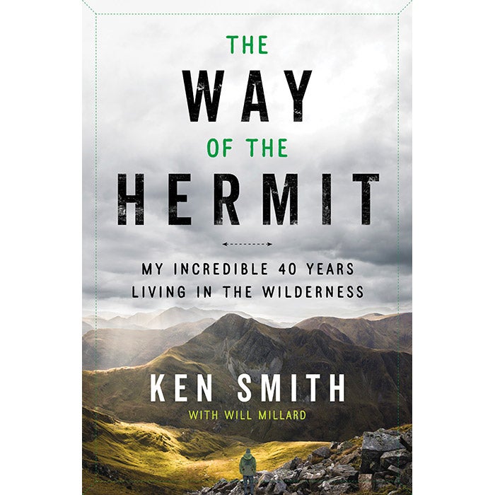 The cover of The Way of a Hermit, depicting a man surveying a vast land and mountain range.