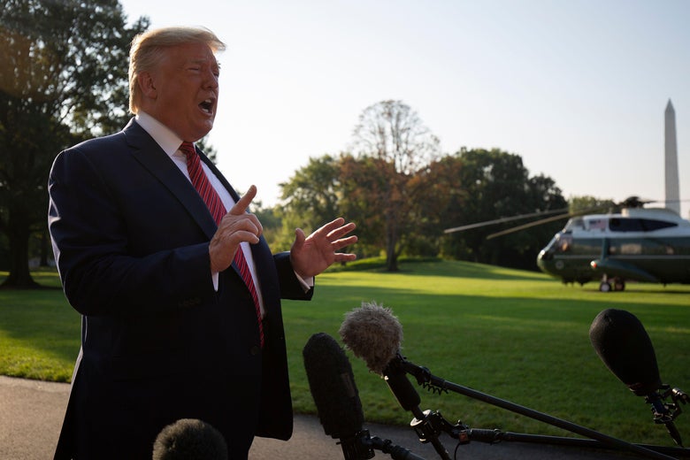 President Donald Trump speaks to the press as he departs the White House in Washington, DC, on September 22, 2019. 