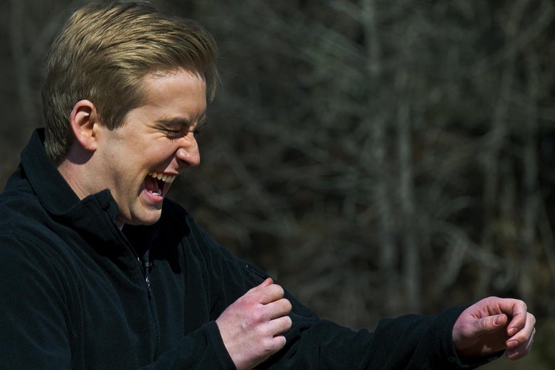 Peter Doocy grimaces as he's hit with a nonlethal directed energy weapon outdoors