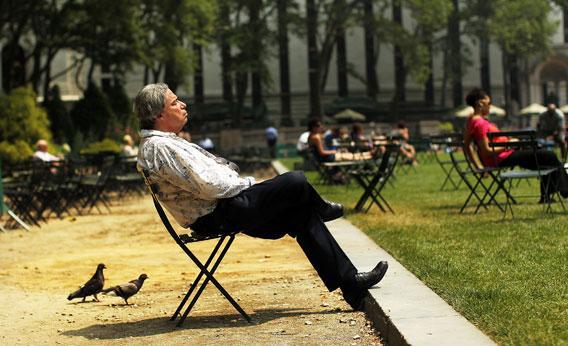 A man takes a break in Bryant Park during a heat wave on June 9, 2011 in New York City.
