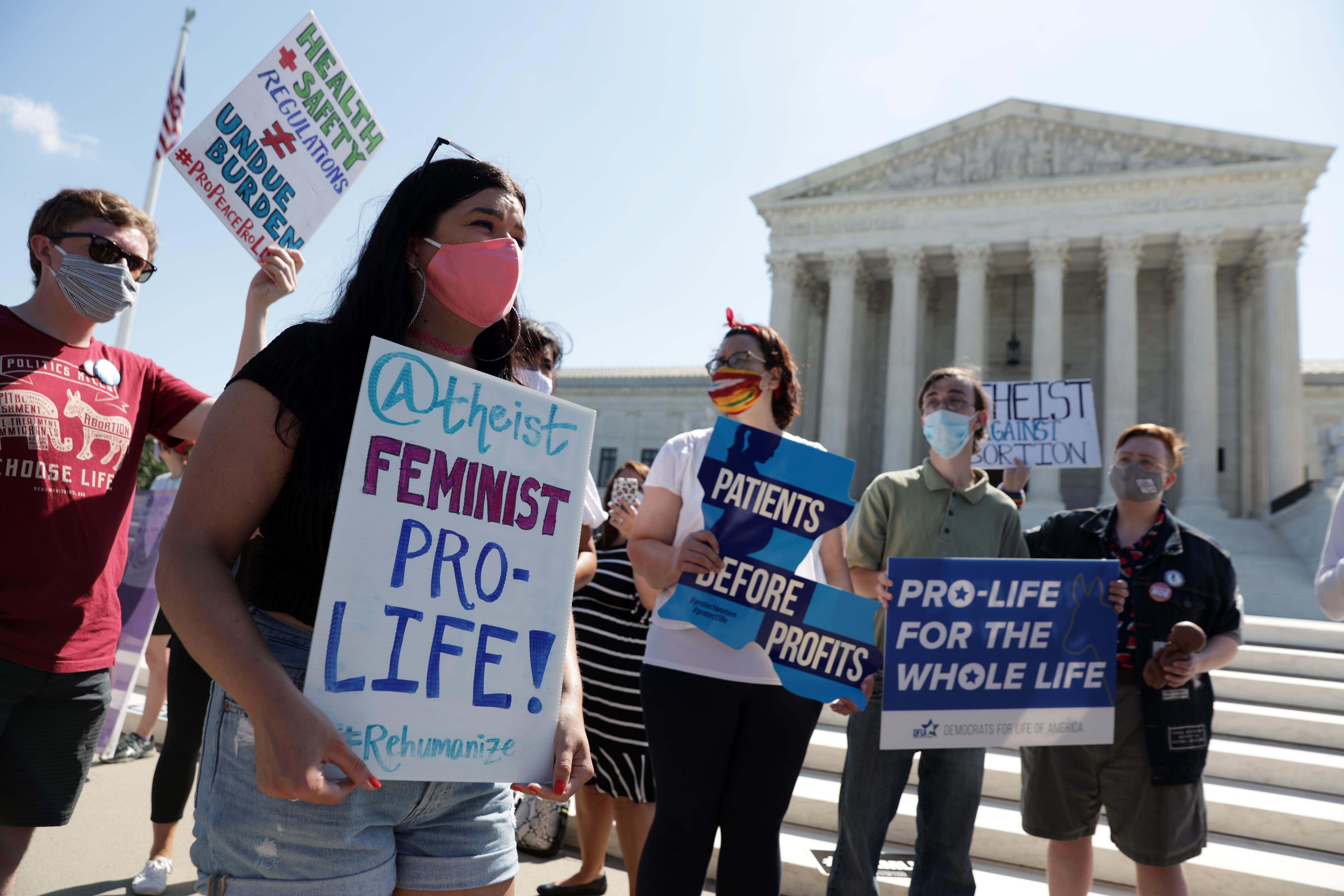 Pro-life activists participate in a demonstration in front of the U.S. Supreme Court June 29, 2020 in Washington, DC. The Supreme Court has ruled today, in a 5-4 decision, a Louisiana law that required abortion doctors need admitting privileges to nearby hospitals unconstitutional.  (Photo by Alex Wong/Getty Images)