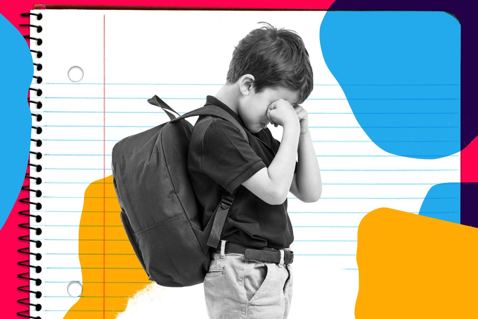 A small boy cries while wearing a backpack.