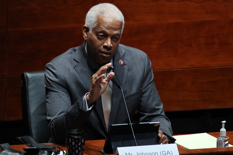 Rep. Hank Johnson speaks into a mic during a congressional hearing.