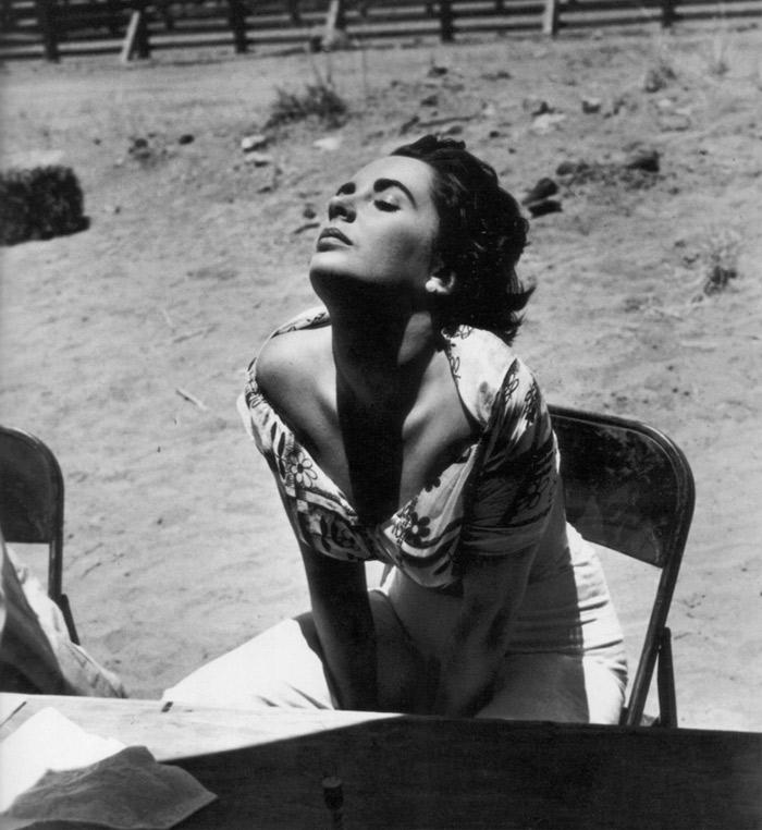 Sid Averey. Elizabeth Taylor sunning herself on the set of 'Giant', Marfa, Texas, 1955