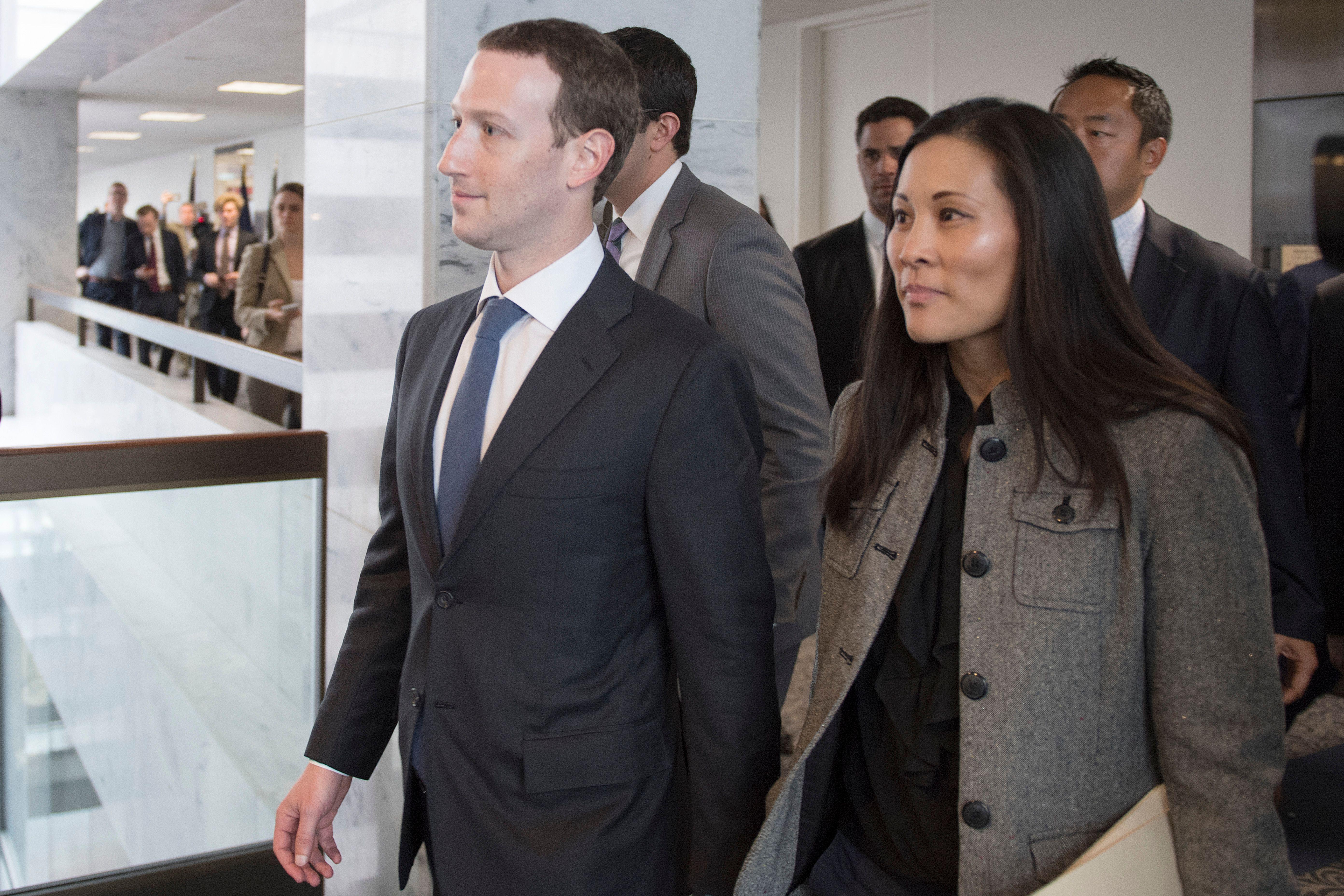 Mark Zuckerberg and Priscilla Chan (R) depart US Senator Bill Nelson's, D- Florida, office on Capitol Hill in Washington, DC, on April 9, 2018.Embattled Facebook chief Mark Zuckerberg has placed the blame for security lapses at the world's largest social network squarely on himself as he girded Monday for appearances this week before angry lawmakers.In prepared remarks released by a congressional panel, Zuckerberg admitted he was too idealistic and failed to grasp how the platform -- used by two billion people -- could be abused and manipulated. / AFP PHOTO / JIM WATSON