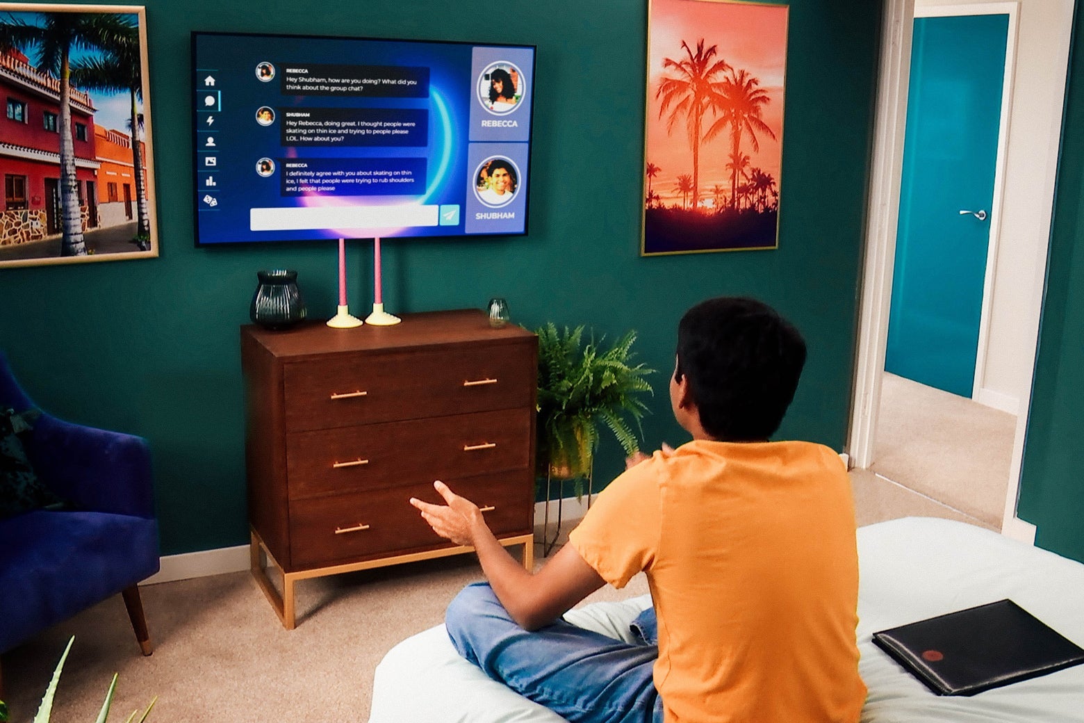 The back of a man named Shubham, sitting on his bed and looking at a screen displaying the Circle.