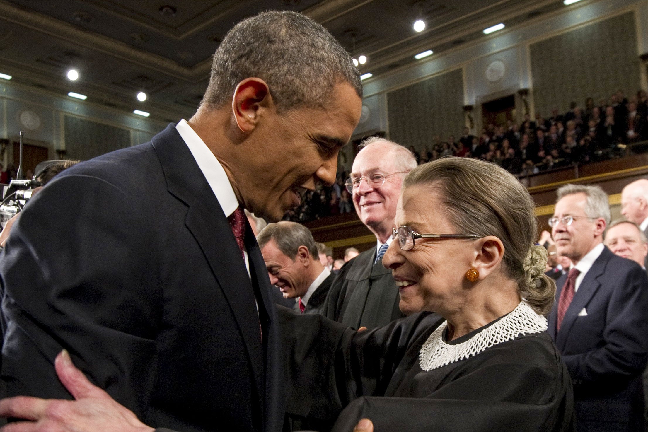 President Barack Obama greets Supreme Court Justice Ruth Bader Ginsburg.