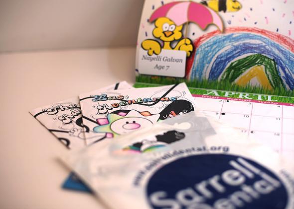 Sarrell's goodie bag, with calendar and Spanish-language coloring book.