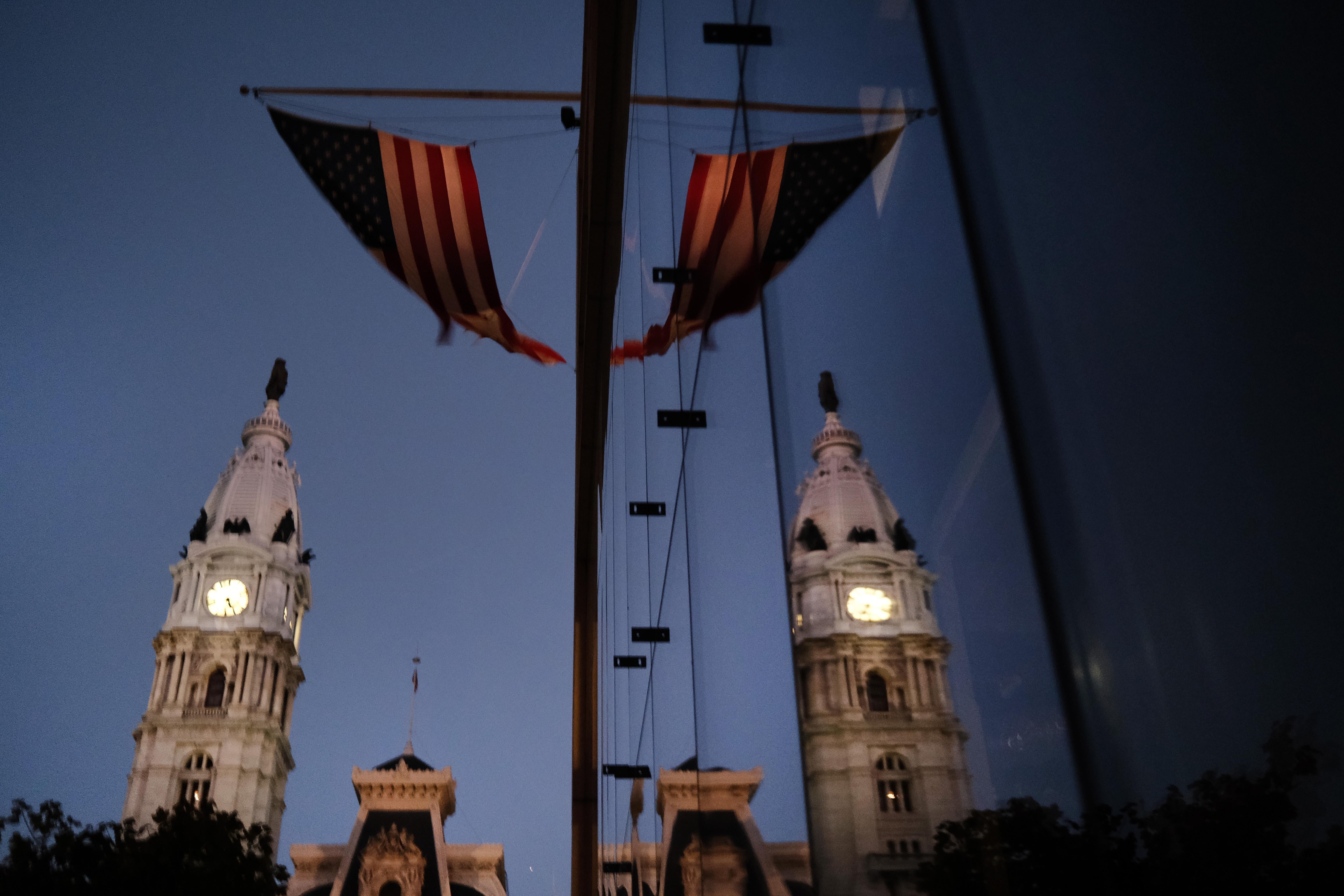 The American flag hangs from a building near Philadelphia City Hall on November 04, 2020 in Philadelphia, Pennsylvania. 