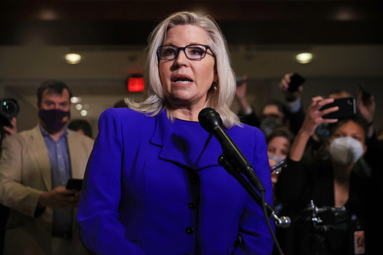 Liz Cheney in front of a mic