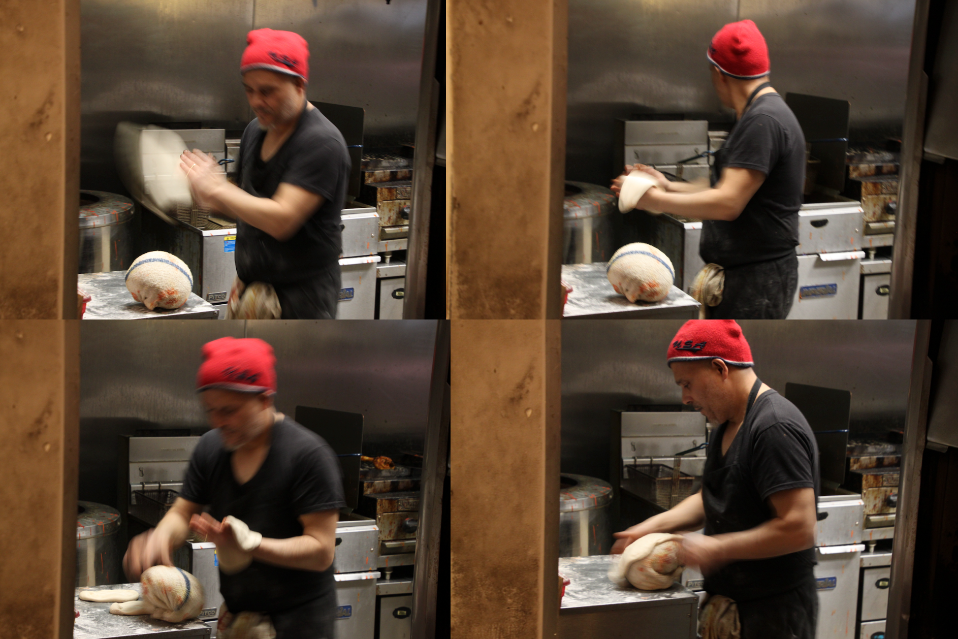 A man in a red hat moves quickly, stretching dough to make naan.