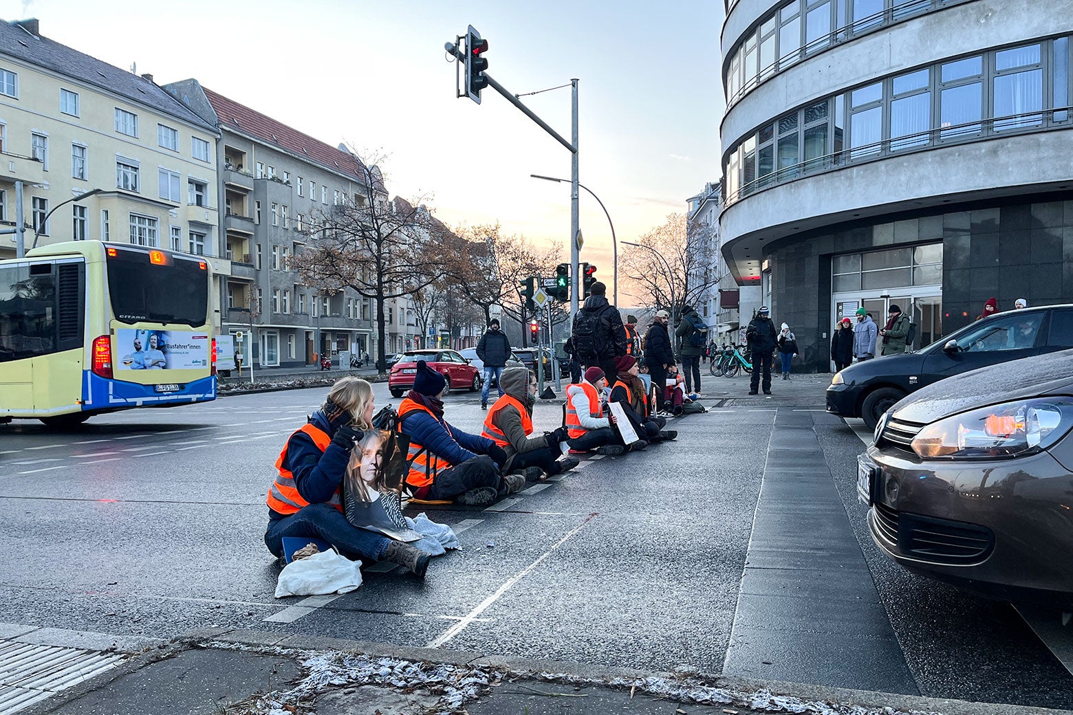 Activists from Letzte Generation block morning rush hour traffic at a Berlin intersection on December 16, one of dozens of demonstrations the group staged in Germany's capital that month.