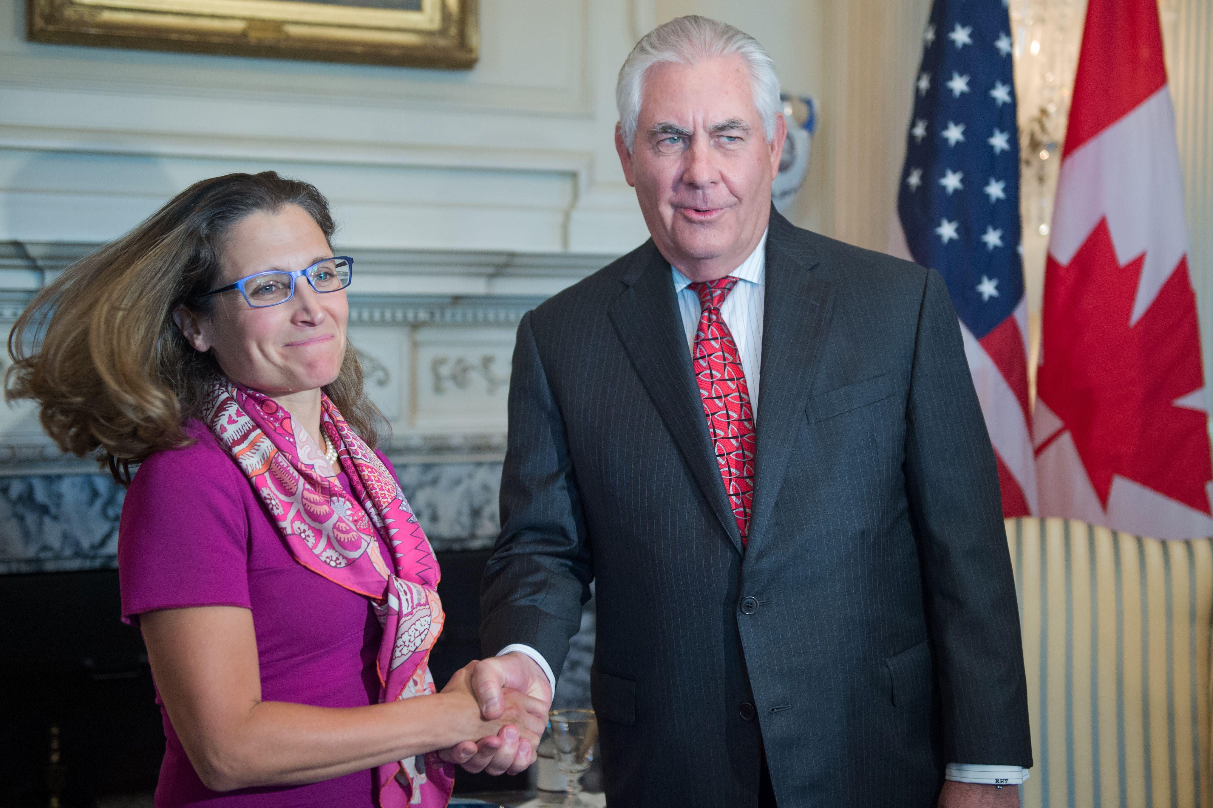Canadian Minister of Foreign Affairs Chrystia Freeland shakes hands with U.S. Secretary of State Rex Tillerson.