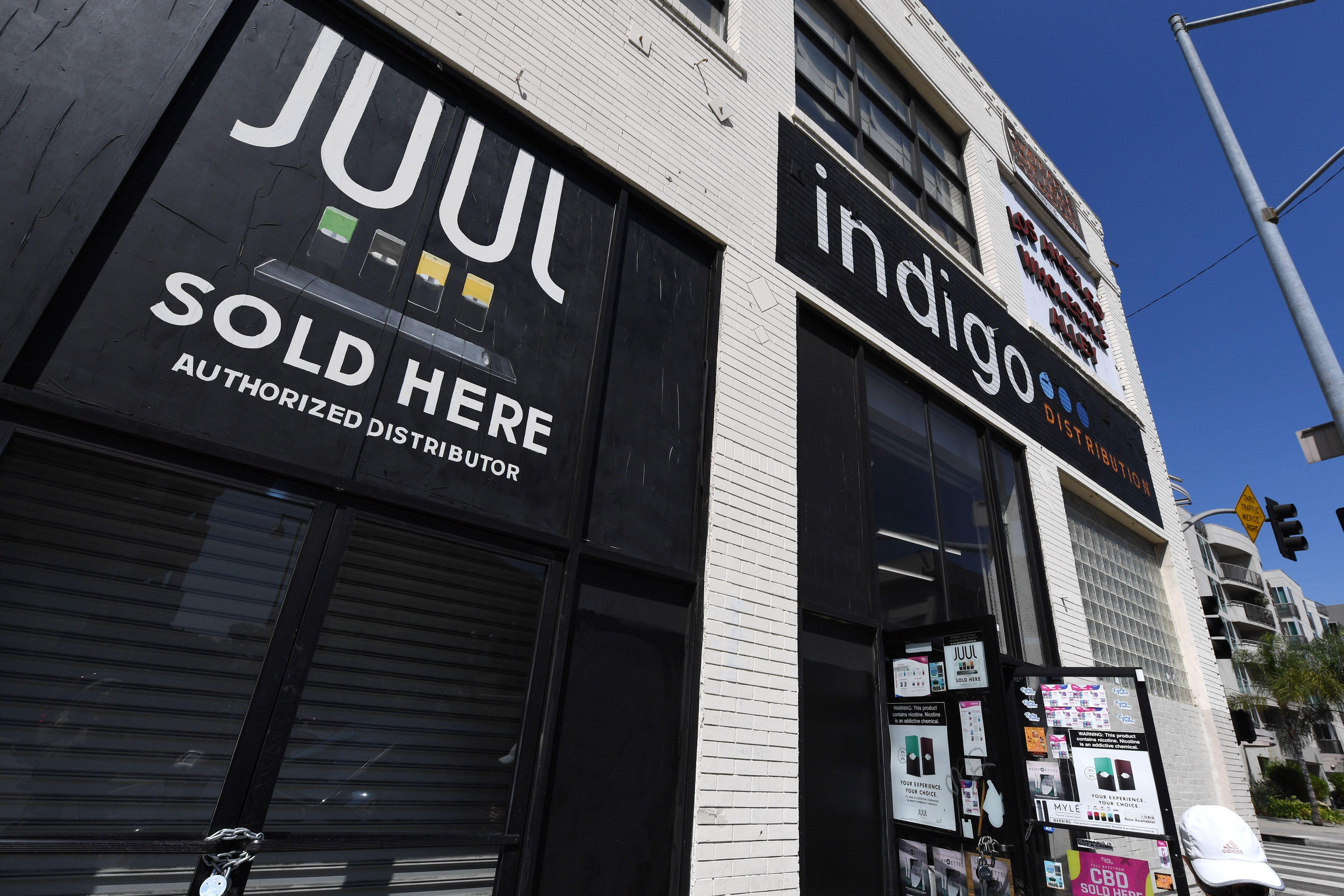 A sign advertises Juul vaping products in Los Angeles.