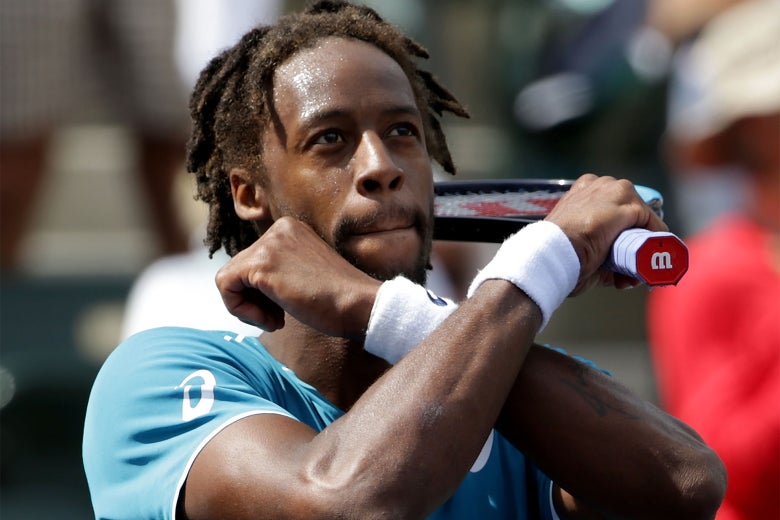 Gaël Monfils celebrates his victory over John Isner at the BNP Paribas Open on Sunday.
