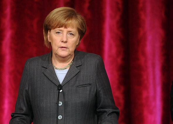 German Chancellor Angela Merkel speaks during a joint press conference with French President Francois Hollande.