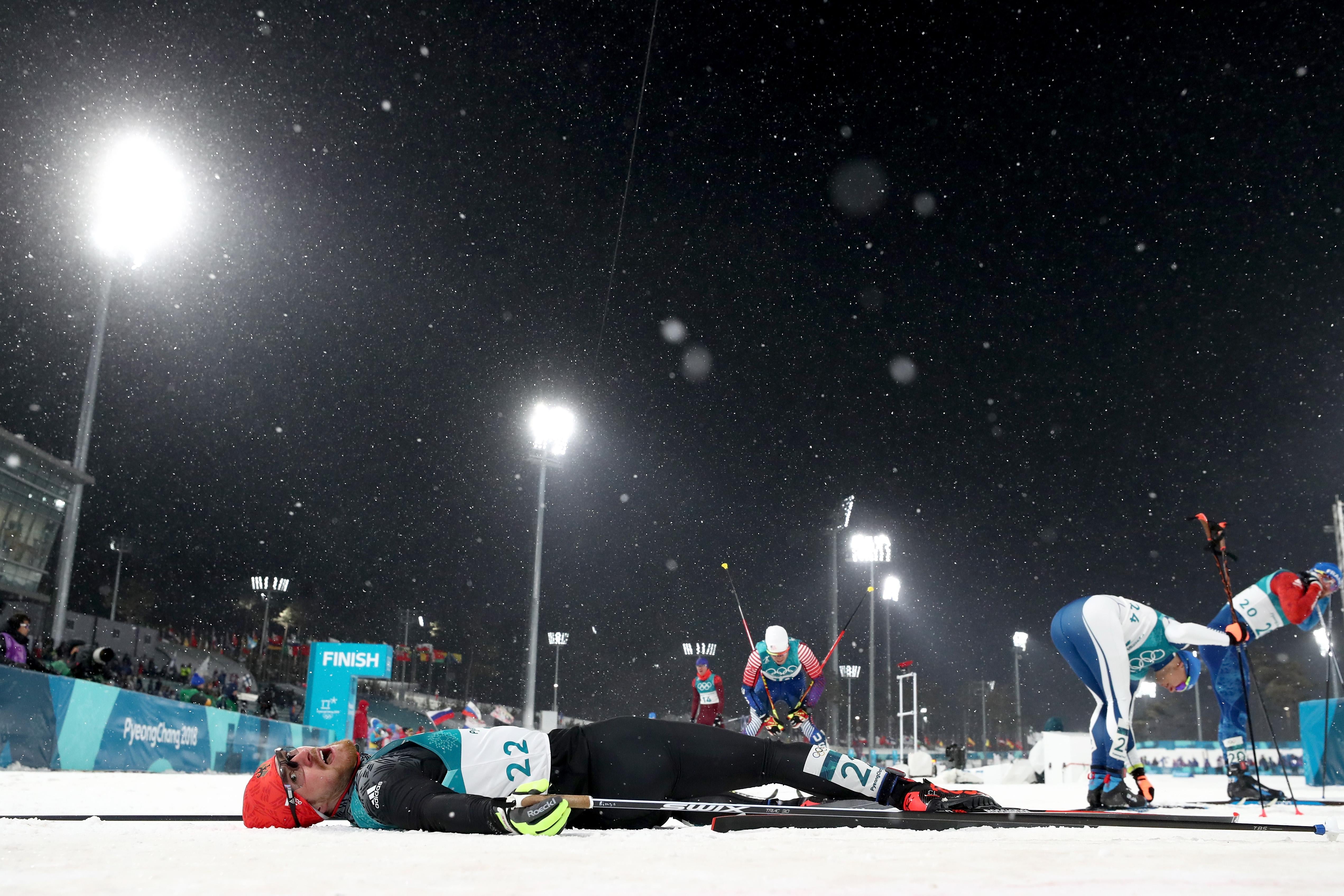 PYEONGCHANG-GUN, SOUTH KOREA - FEBRUARY 13:  Thomas Bing of Germany lays on the snow during the Cross-Country Men's Sprint Classic Quarterfinal on day four of the PyeongChang 2018 Winter Olympic Games at Alpensia Cross-Country Centre on February 13, 2018 in Pyeongchang-gun, South Korea.  (Photo by Al Bello/Getty Images)