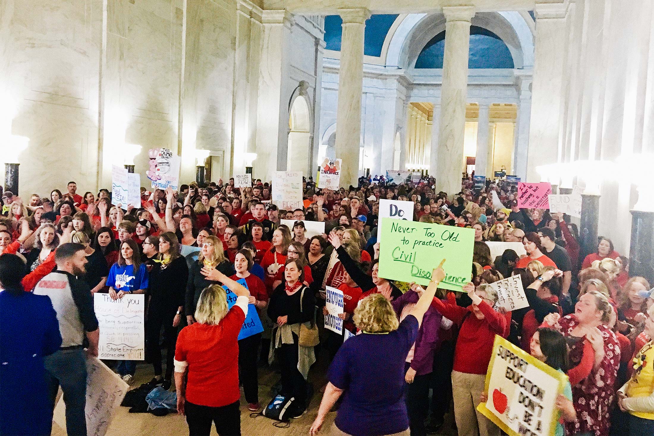 Teachers rally outside the state Senate chambers at the Capitol in Charleston, W.Va., on Thursday, March 1, 2018.