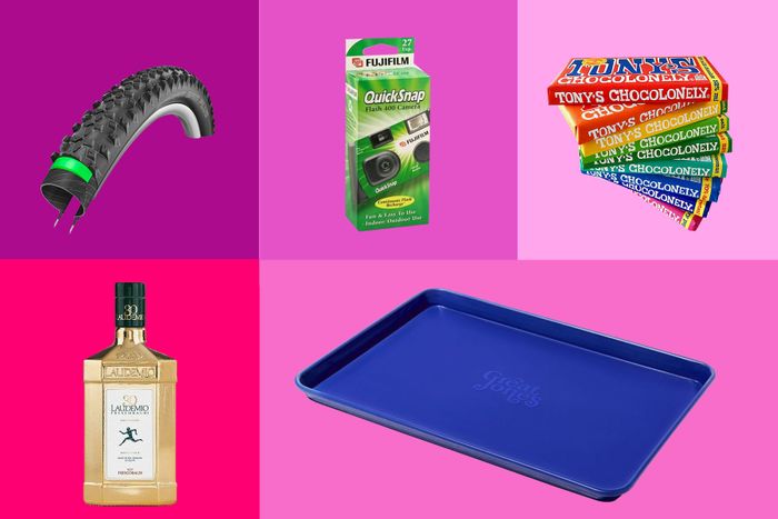 Assorted gifts, including chocolate, a disposable camera, and olive oil.