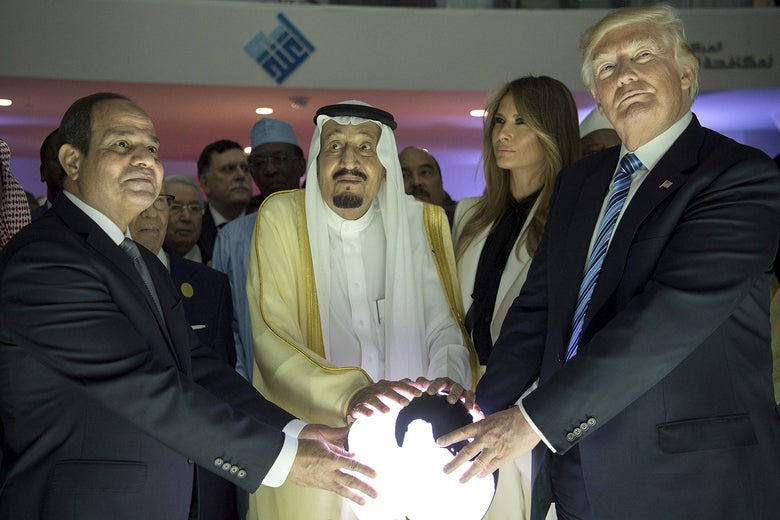 Trump, Sisi, and King Salman place their hands on an orb.