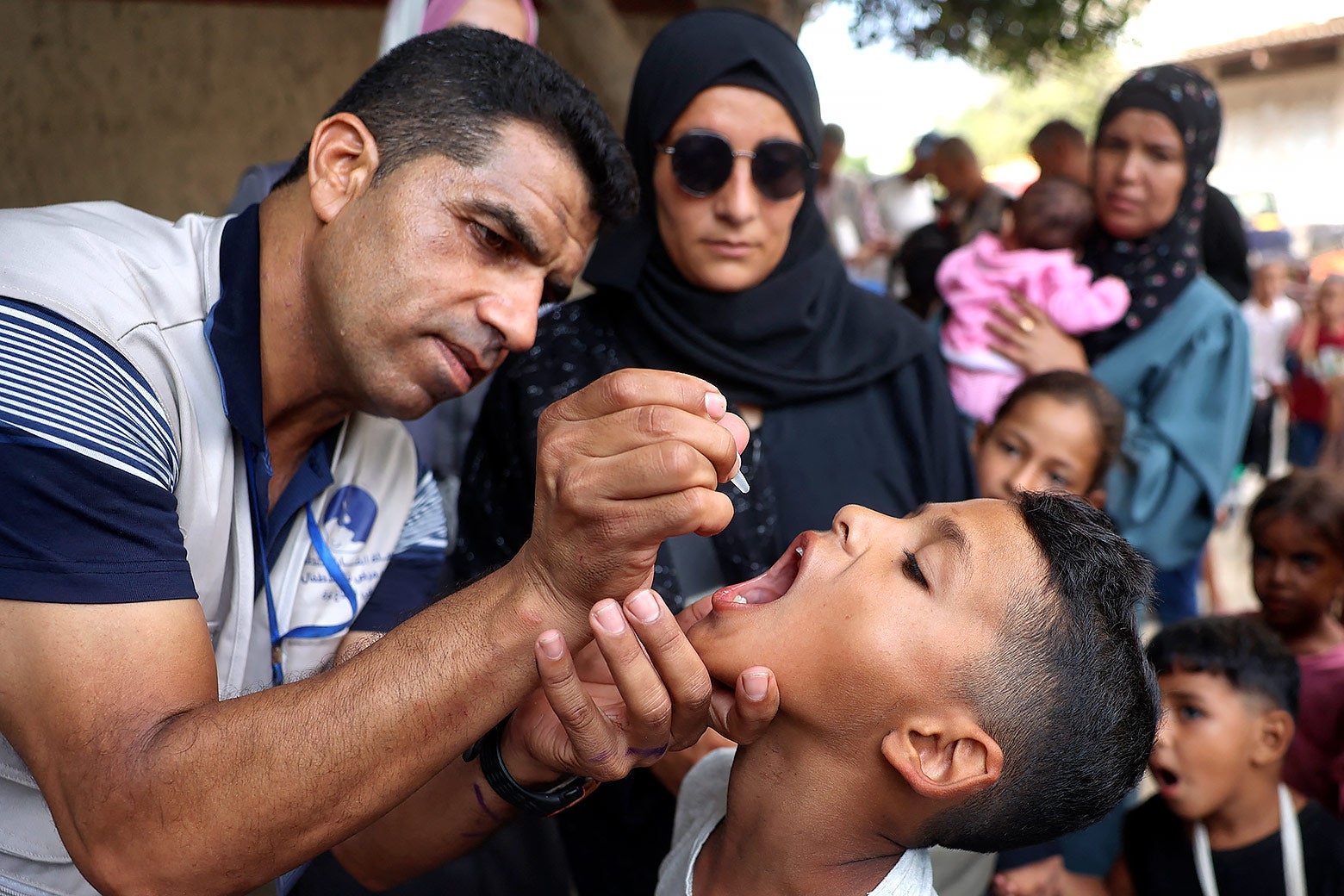 Polio vaccines in Gaza amid the Israel–Hamas war: Water, disease, and health threats to Palestinians.