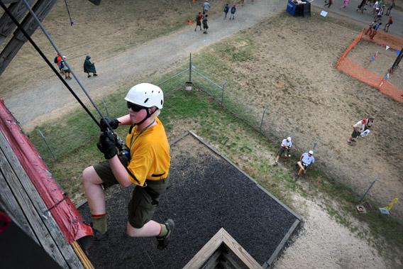 A Boy Scout makes his way down a rappelling wall on July 29, 2010 during the National Scout Jamboree in Virginia