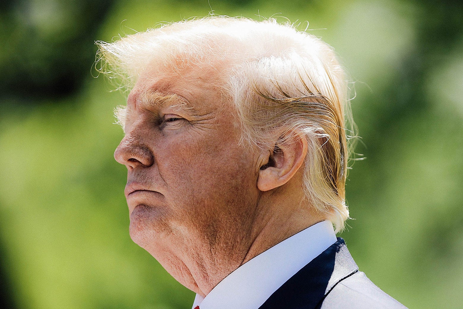 President Donald Trump listens to reporters’ questions in the Rose Garden of the White House on Monday in Washington.