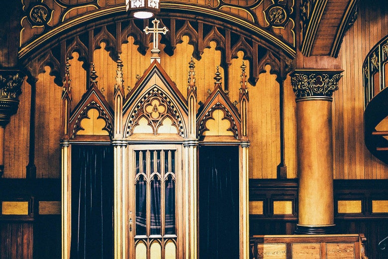 An ornate confessional booth.